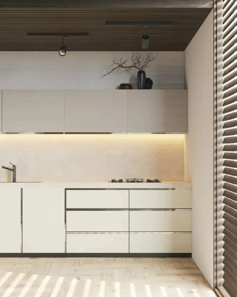Cozinha moderna em tons claros com bancada e iluminação embutida